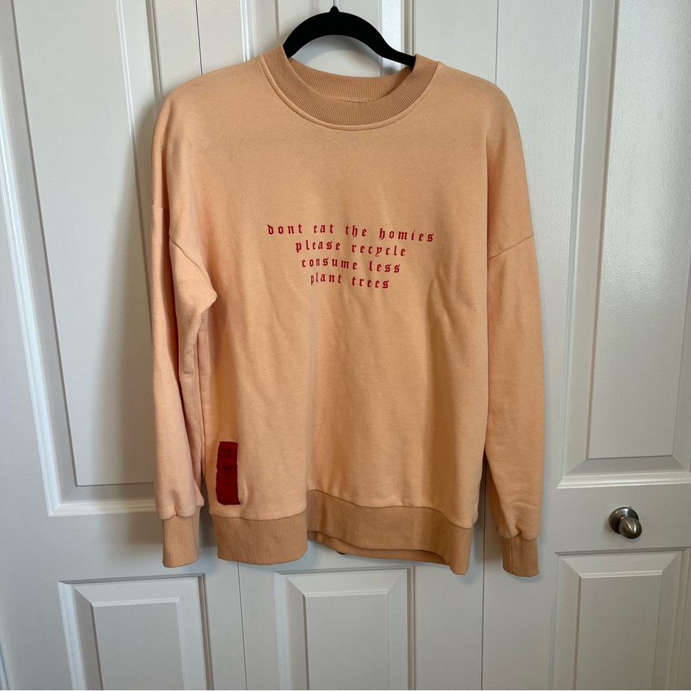 Peach “Don’t Eat the Homies” Sweatshirt with Red Text